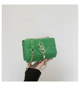 Green quilted chain crossbody bag for women, fashion small square shoulder bag with tassel.