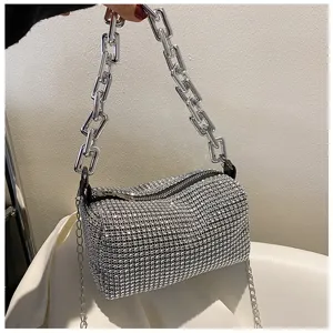 Rhinestone cylinder shoulder bag with chunky chain strap, sparkling evening crossbody purse.