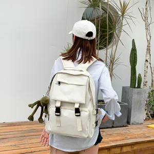 Large capacity white canvas backpack workwear style school bag for students casual daily use.