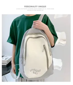 Two-tone casual nylon backpack for men and women, large capacity school bag with embroidery.