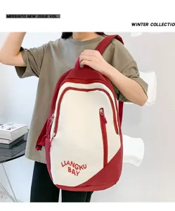 Casual contrast color large capacity nylon backpack for students, stylish daily school bag.
