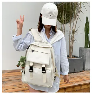 Japanese ins style large capacity utility canvas school backpack with cute dinosaur pendant