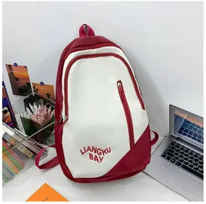 Detailed view of the stylish color-block nylon backpack with custom embroidery. Perfect for students.