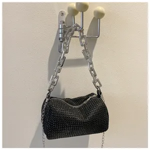 Chunky chain crystal shoulder bag for women, retro black rhinestone underarm handbag style.