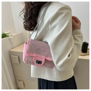 Pink rhinestone chain shoulder bag detailed view, elegant evening flap bag with metal turn-lock.