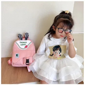 Japanese style cute kids backpack with rabbit ears in macaron pink for daily school use.