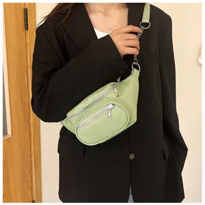Casual women light green waist bag with metal chain and zippers, stylish daily shoulder bag.