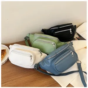Detailed view of trendy multi-color PU leather waist bags, casual chest bag for daily wear.