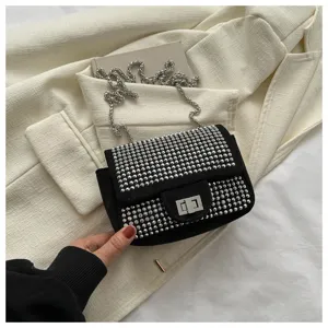 Rhinestone embellished black flap shoulder bag with metal chain and chic square lock design.