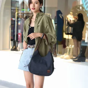 Vintage large capacity canvas shoulder bag for women, casual solid color hobo handbag.
