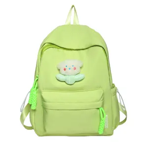 Light green minimalist casual backpack for women and students with cute plush decoration.