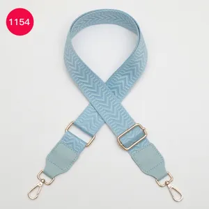 Light blue wide replacement bag strap adjustable shoulder crossbody strap with leather ends.