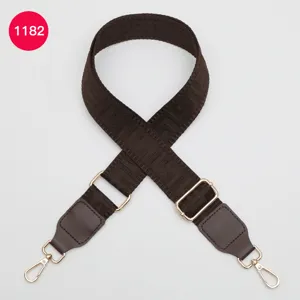Brown woven wide bag strap replacement with adjustable gold hardware and leather details