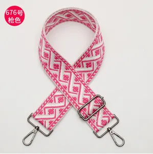 Adjustable colorful wide replacement bag strap with ethnic geometric pattern and gunmetal hardware.