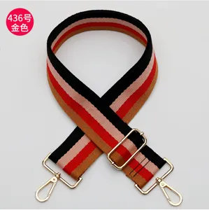 Adjustable colorful striped bag strap detail, replacement shoulder messenger belt with gold hardware.