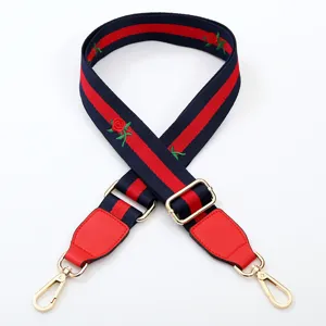 Replacement canvas bag strap with embroidered roses and red blue stripe design for crossbody bags.
