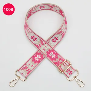 Ethnic floral woven replacement bag strap with gold hardware for shoulder crossbody bags.