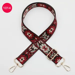 Colorful ethnic woven replacement bag strap with floral pattern and metal hardware clips.