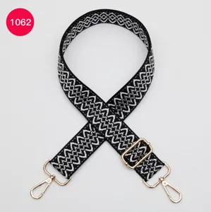 Black and white woven replacement bag strap, adjustable crossbody shoulder strap with gold hardware.
