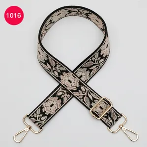 Ethnic floral jacquard wide bag strap with gold-tone hardware for crossbody bags.