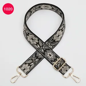 Ethnic floral jacquard wide bag strap replacement shoulder strap with gold hardware details.