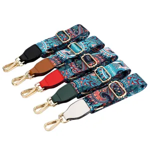 Adjustable wide bag strap with bohemian ethnic print and metal hardware for women handbag.