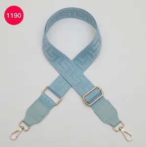 Light blue replacement bag strap with Greek key woven pattern and adjustable gold hardware