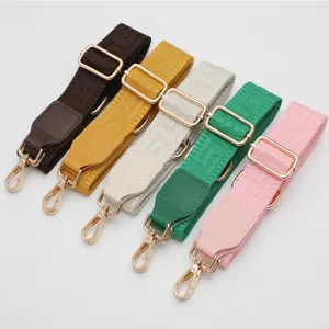 Colorful replacement bag straps with adjustable gold hardware and durable woven canvas design.