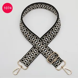 Verstelbare jacquard vervangende tassenriem, zwart-wit geweven schouderband met goud beslag.