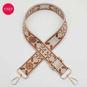 Ethnic jacquard wide bag strap detail, adjustable metal hardware hooks, beige brown.