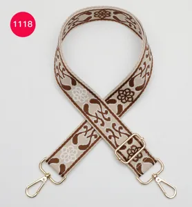 Ethnic style woven wide bag strap replacement, beige and brown shoulder strap with gold hardware.