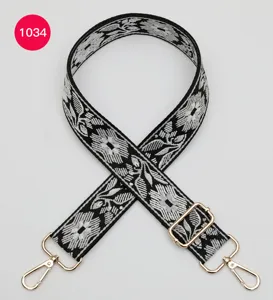 Black and white floral jacquard bag strap with gold hardware, ethnic style wide crossbody strap.