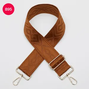 Bandoulière de sac tissée de remplacement avec boucles métalliques et motif géométrique.