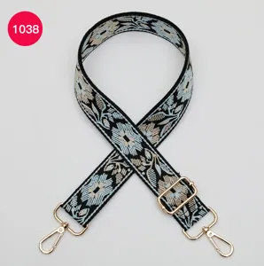 Ethnic style floral jacquard replacement shoulder strap for crossbody bags with gold hardware.