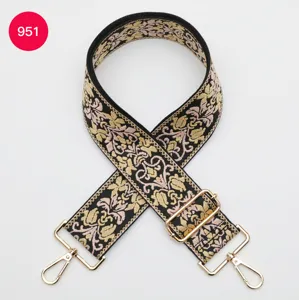 Ethnic jacquard wide bag strap replacement with gold hardware and adjustable buckle.