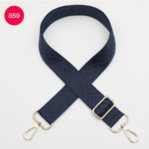 Tracolla romboidale blu scuro, cinghia di ricambio regolabile con fibbie metalliche dorate.