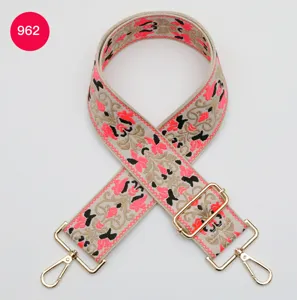 Ethnic style wide bag strap detail, adjustable jacquard shoulder belt with metal hardware.