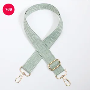 Replacement adjustable woven guitar style bag strap with gold hardware for crossbody purses.