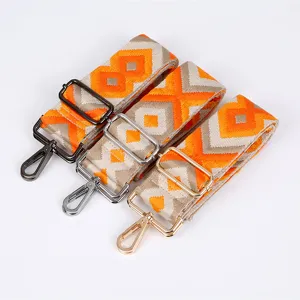 Ethnic style wide bag strap replacement, adjustable shoulder cross body strap with metal hardware.