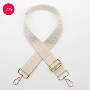 Beige replacement bag strap with golden metal hardware and classic geometric woven pattern for bags