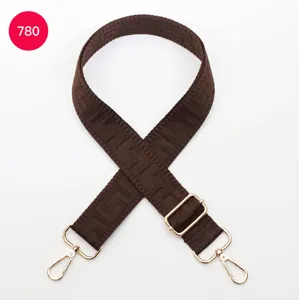 Replacement brown canvas shoulder bag strap with adjustable length and gold hardware.