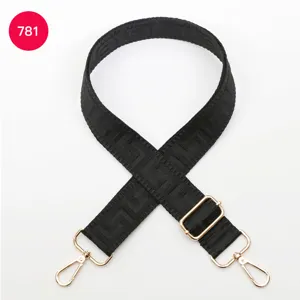 Adjustable black replacement shoulder bag strap with labyrinth pattern and gold hardware hooks.
