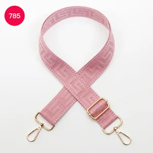Pink adjustable replacement bag strap with Greek key pattern and gold hardware.