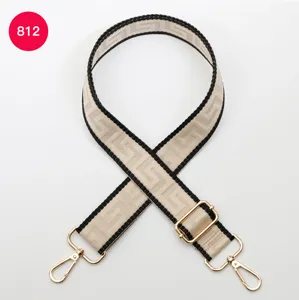 Adjustable wide replacement shoulder strap for handbags with stylish woven labyrinth pattern.
