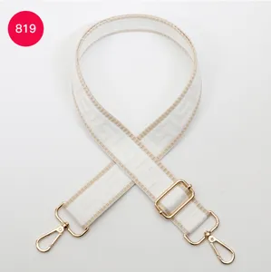 Adjustable replacement wide bag strap with Greek key labyrinth pattern and gold hardware