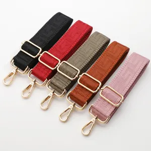 Replacement wide bag strap with colorful maze pattern and gold metal hardware, adjustable.
