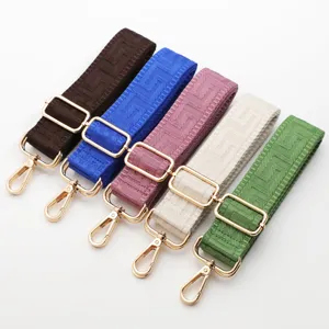 Adjustable wide replacement shoulder strap with geometric pattern for stylish crossbody bags.