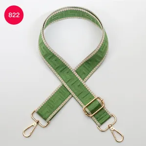 Replacement woven bag strap with classic labyrinth pattern and gold hardware for crossbody bags.