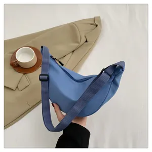 Blue nylon crescent crossbody bag for women, lightweight sporty dumpling shoulder bag new