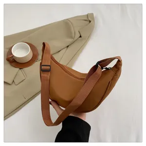 Women's nylon crossbody shoulder bag, lightweight sporty dumpling bag, casual daily handbag.